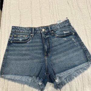 Good American Blue Jean Shorts with High Waist and Frayed Hem